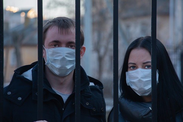 couple wearing face masks