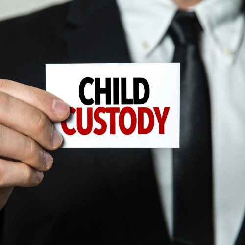 man holding child custody sign