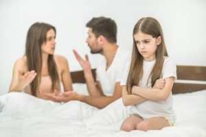 daughter annoyed to arguing parents