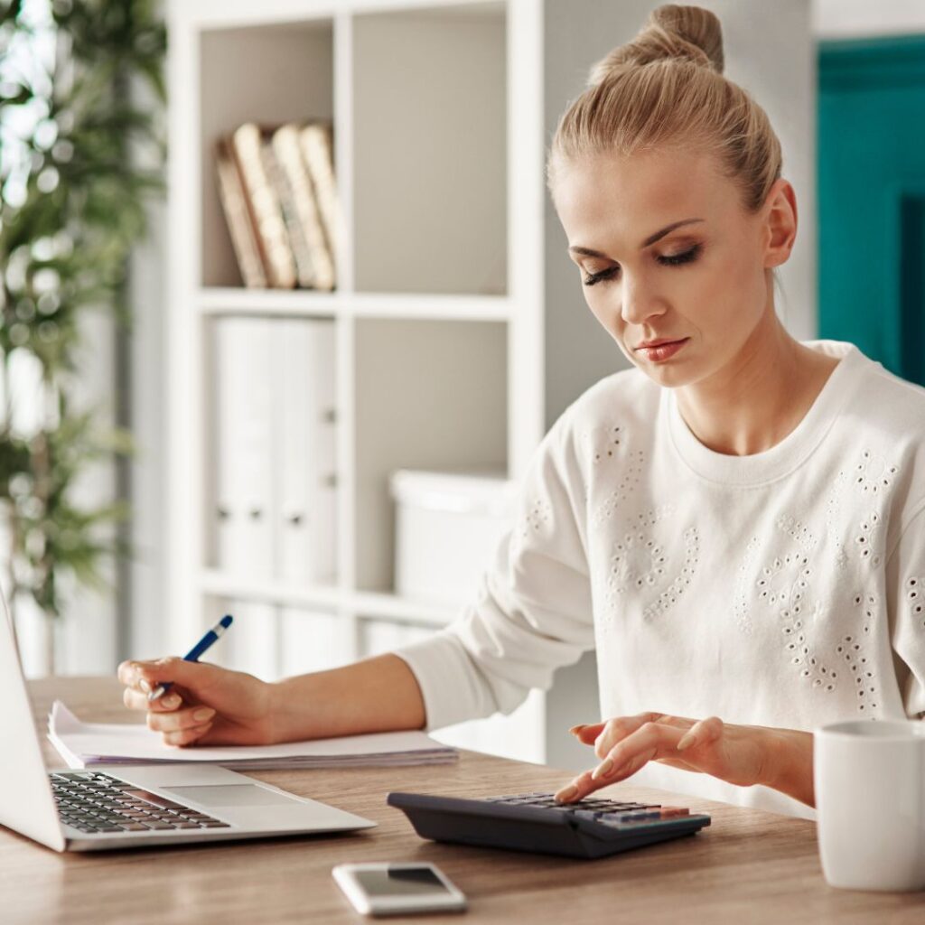 Woman calculating finances