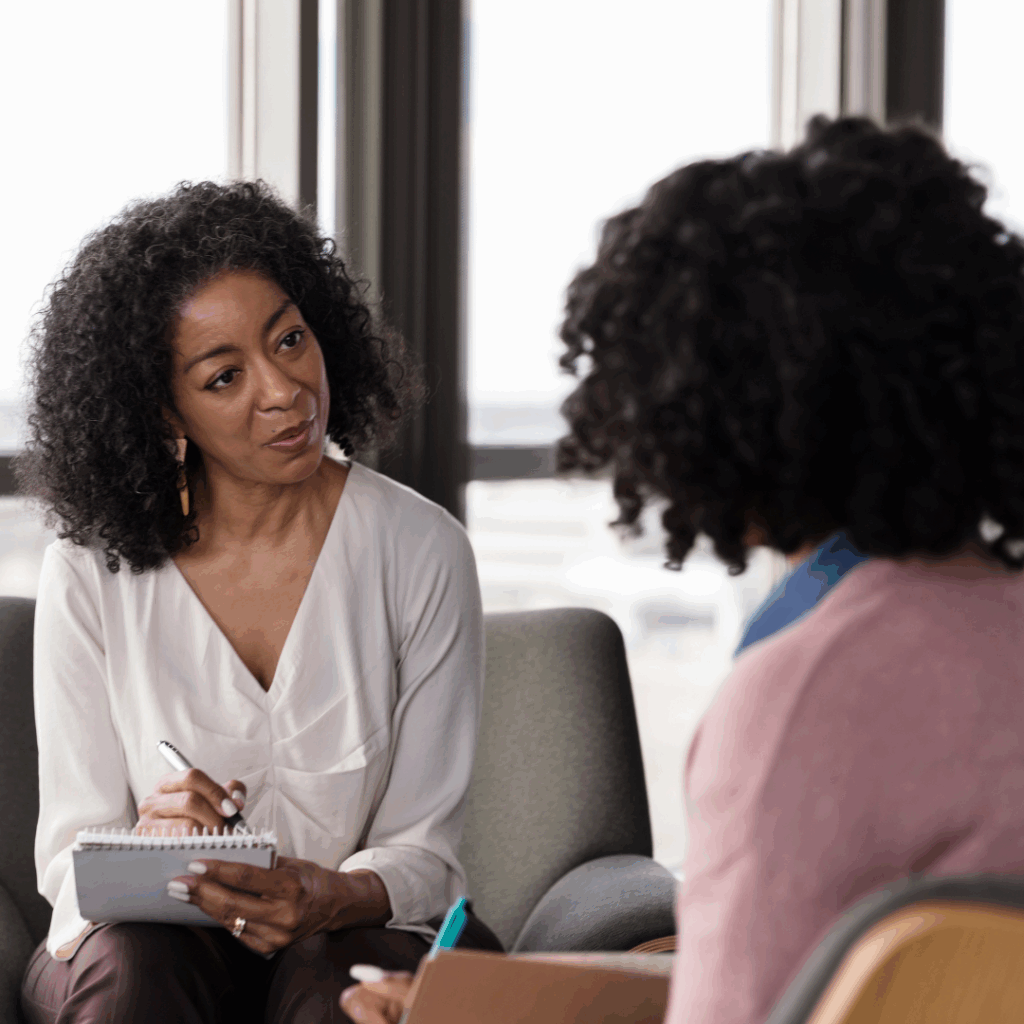 Woman talking to woman therapist