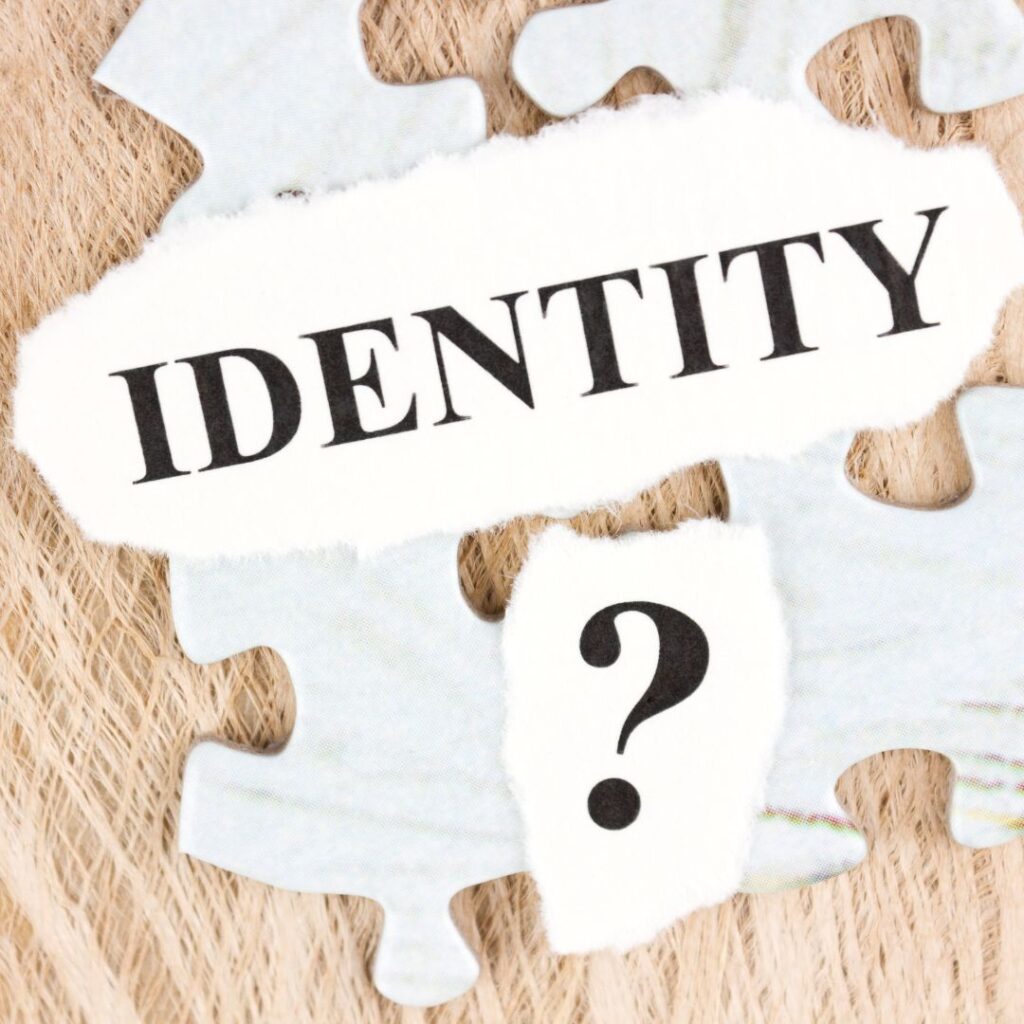 puzzle pieces with identity written on top